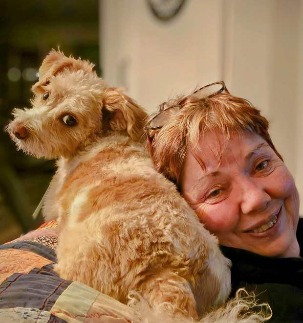 Paula, Lou's wife of 30 years, with Zeus the family dog